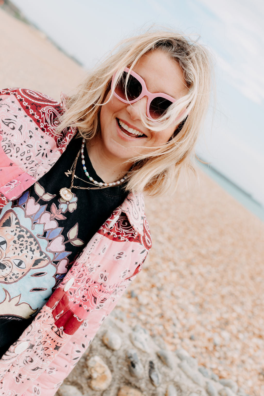 zoedepass Lauryn Candy Pink sunglasses close-up on model