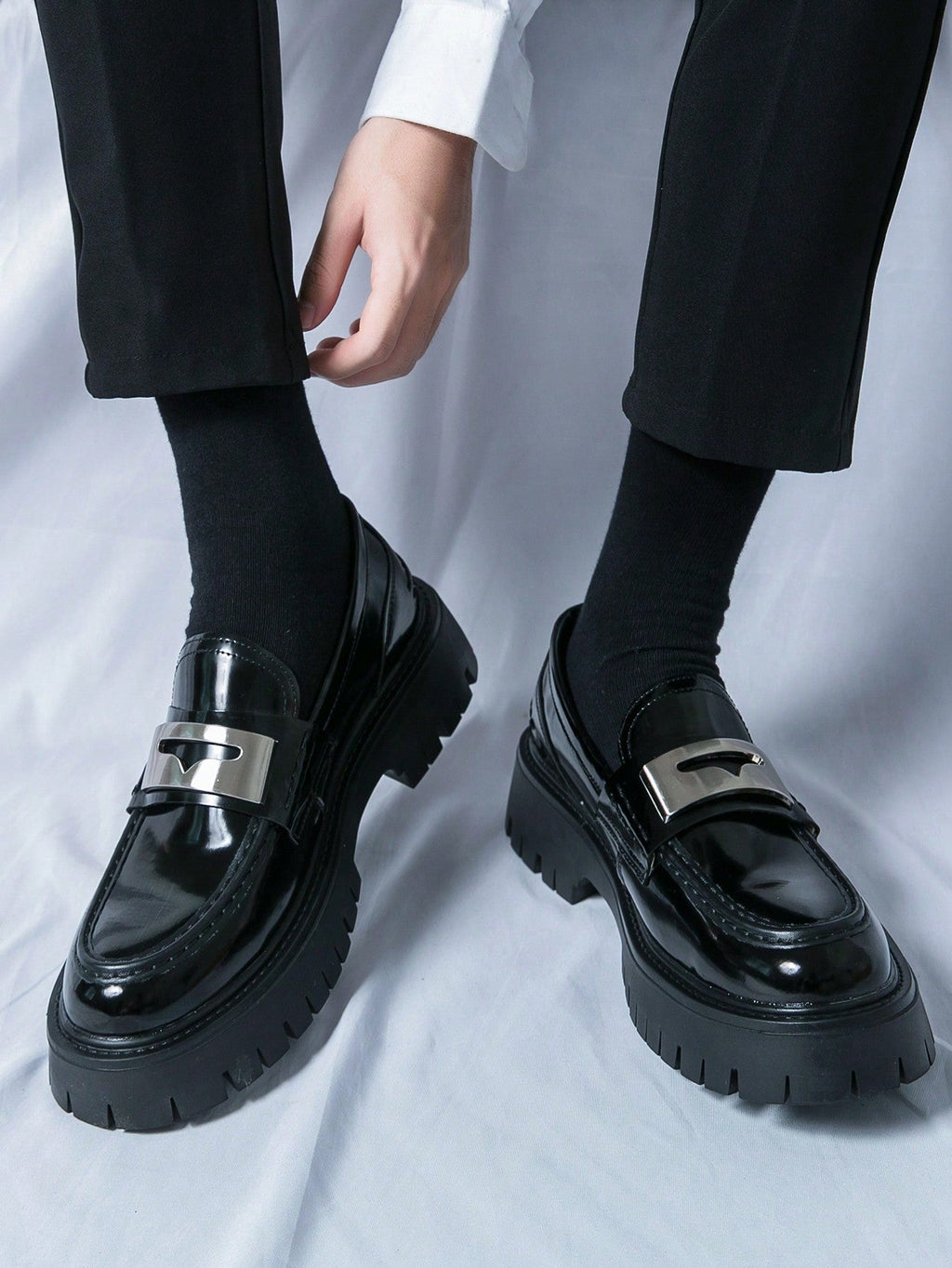 Kenike black patent party loafers side profile