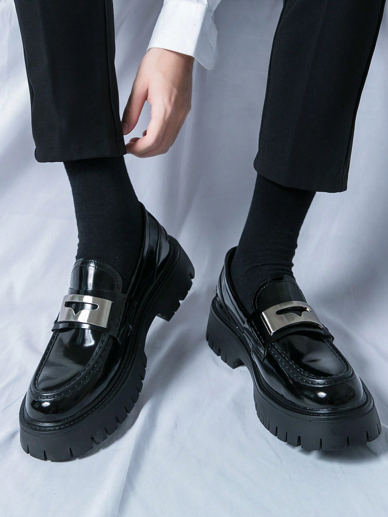 Kenike black patent party loafers side profile