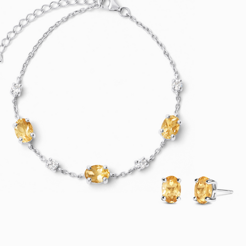 Citrine jewellery set with bracelet and earrings in sterling silver on white background