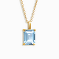 Blue topaz emerald cut pendant necklace in 18k gold vermeil on white background