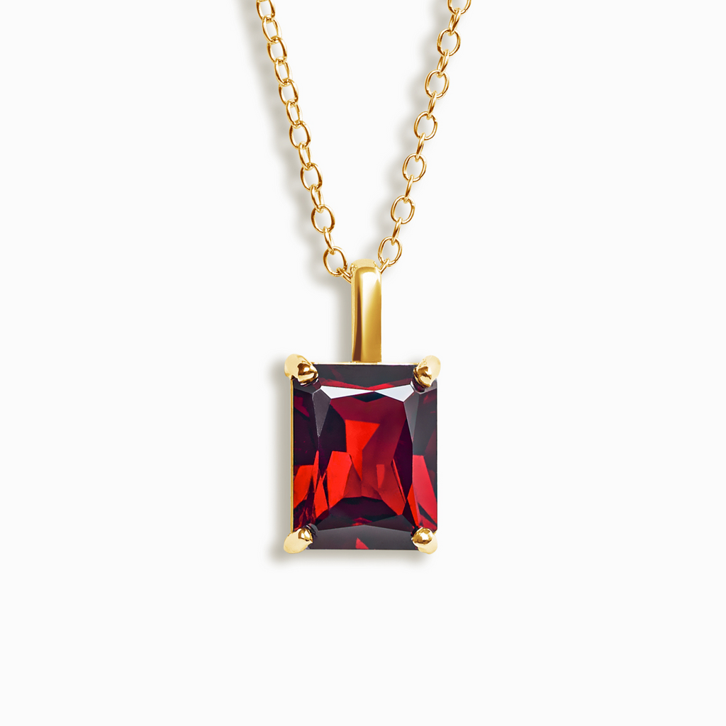 Garnet emerald cut pendant necklace in 18k gold vermeil on white background