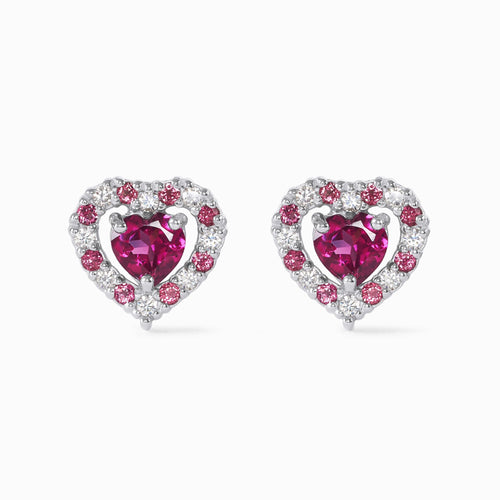 Rhodolite garnet heart stud earrings in sterling silver on white background