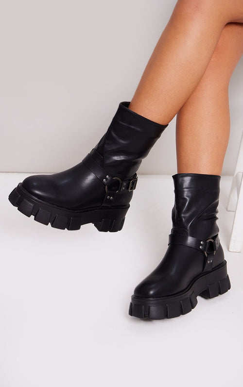 Kenike black buckle strap cleated sole ankle boots variant