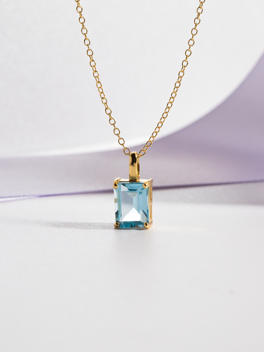 Blue topaz emerald cut pendant necklace in 18k gold vermeil detail image