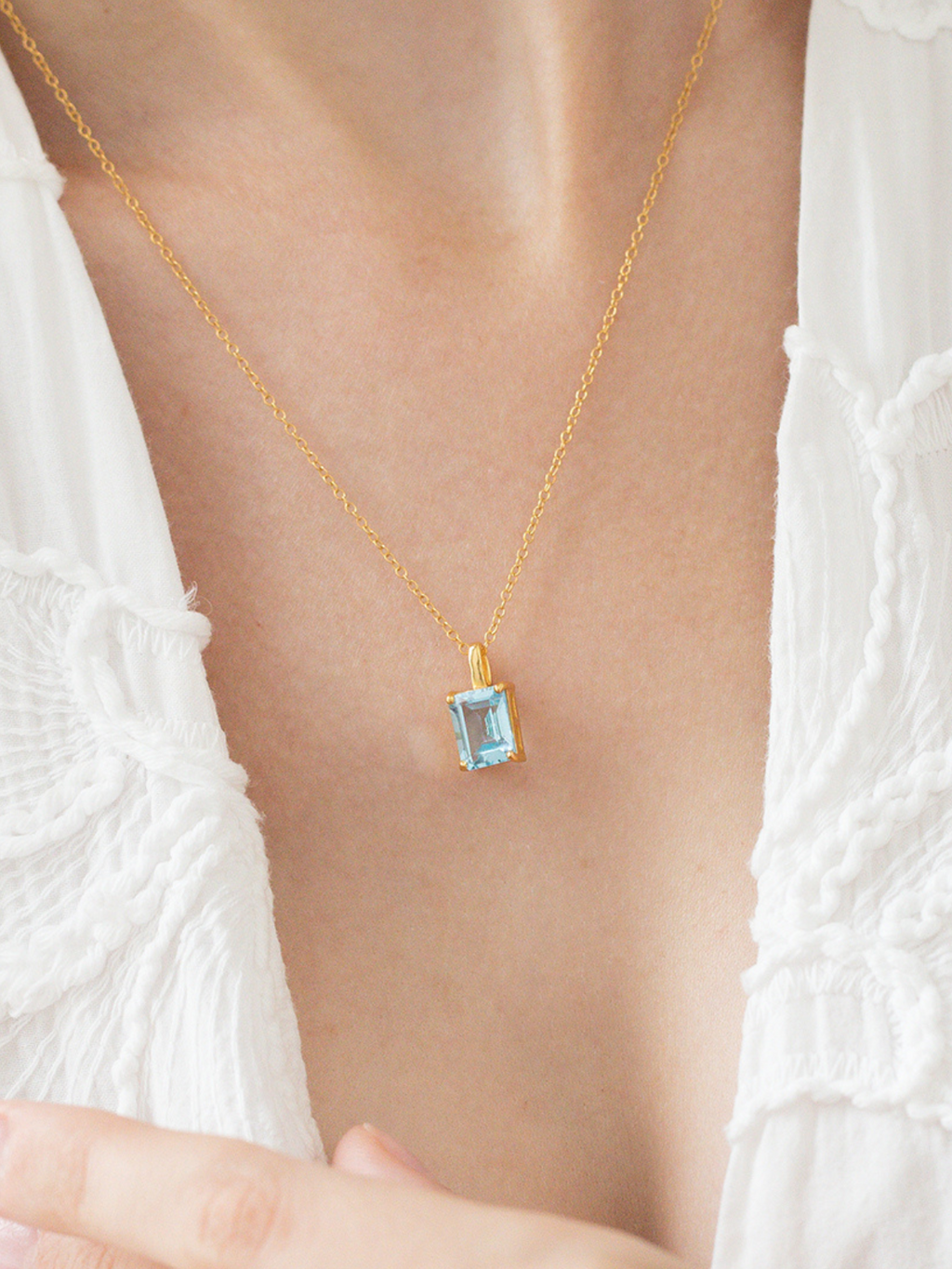 Blue topaz emerald cut pendant necklace in 18k gold vermeil model image
