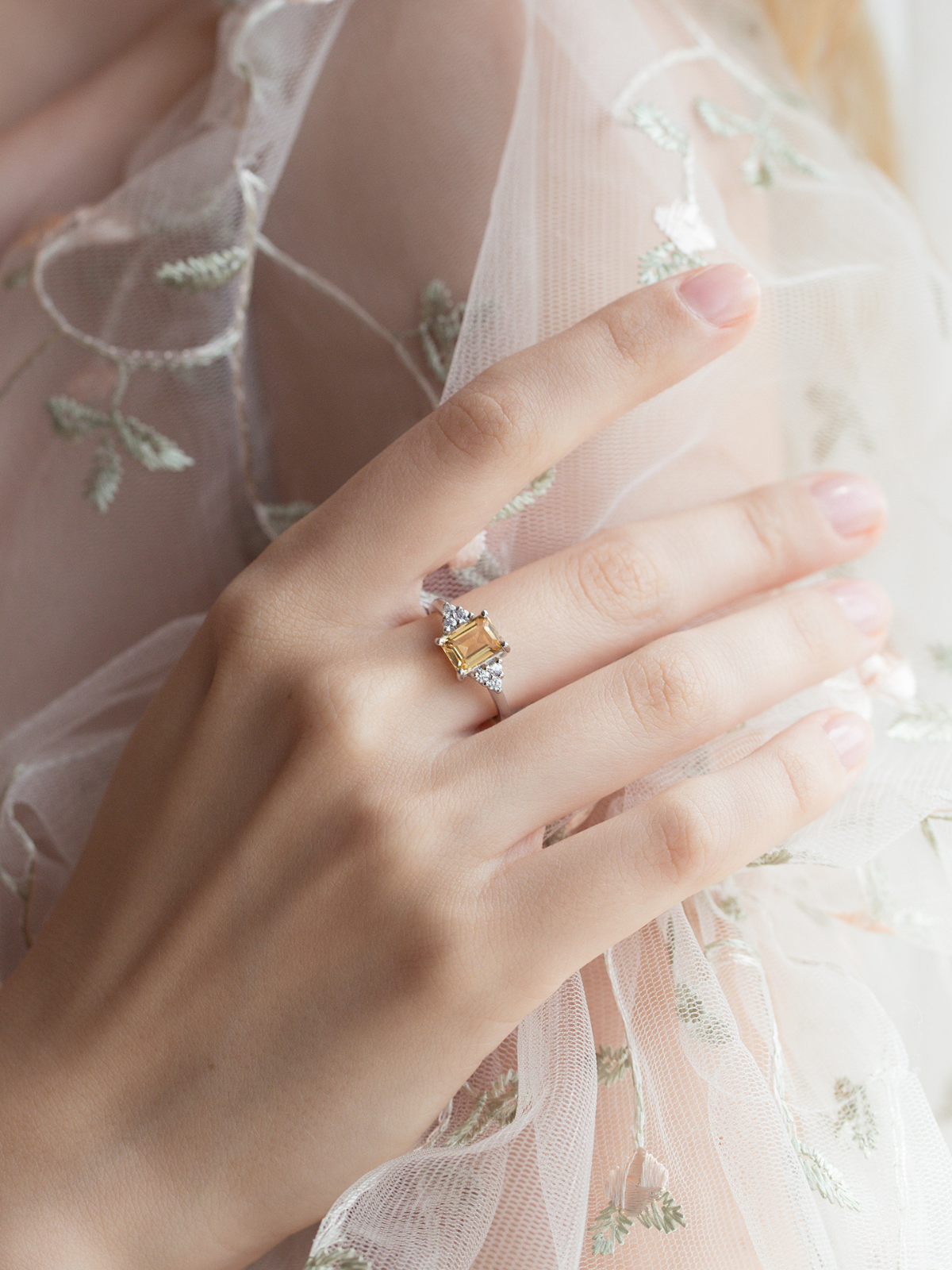 Citrine emerald cut ring in sterling silver on model