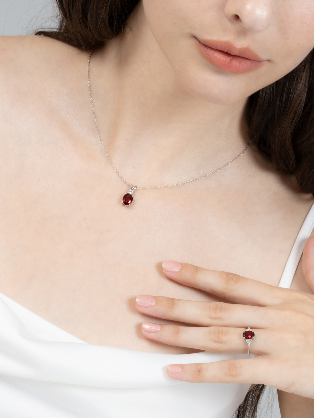 Garnet necklace and ring in sterling silver