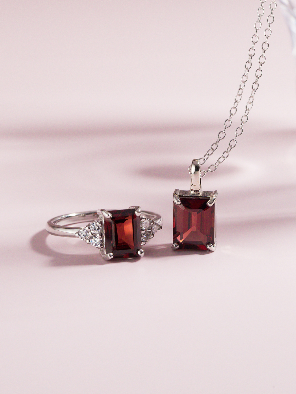 Garnet emerald cut ring and necklace in sterling silver