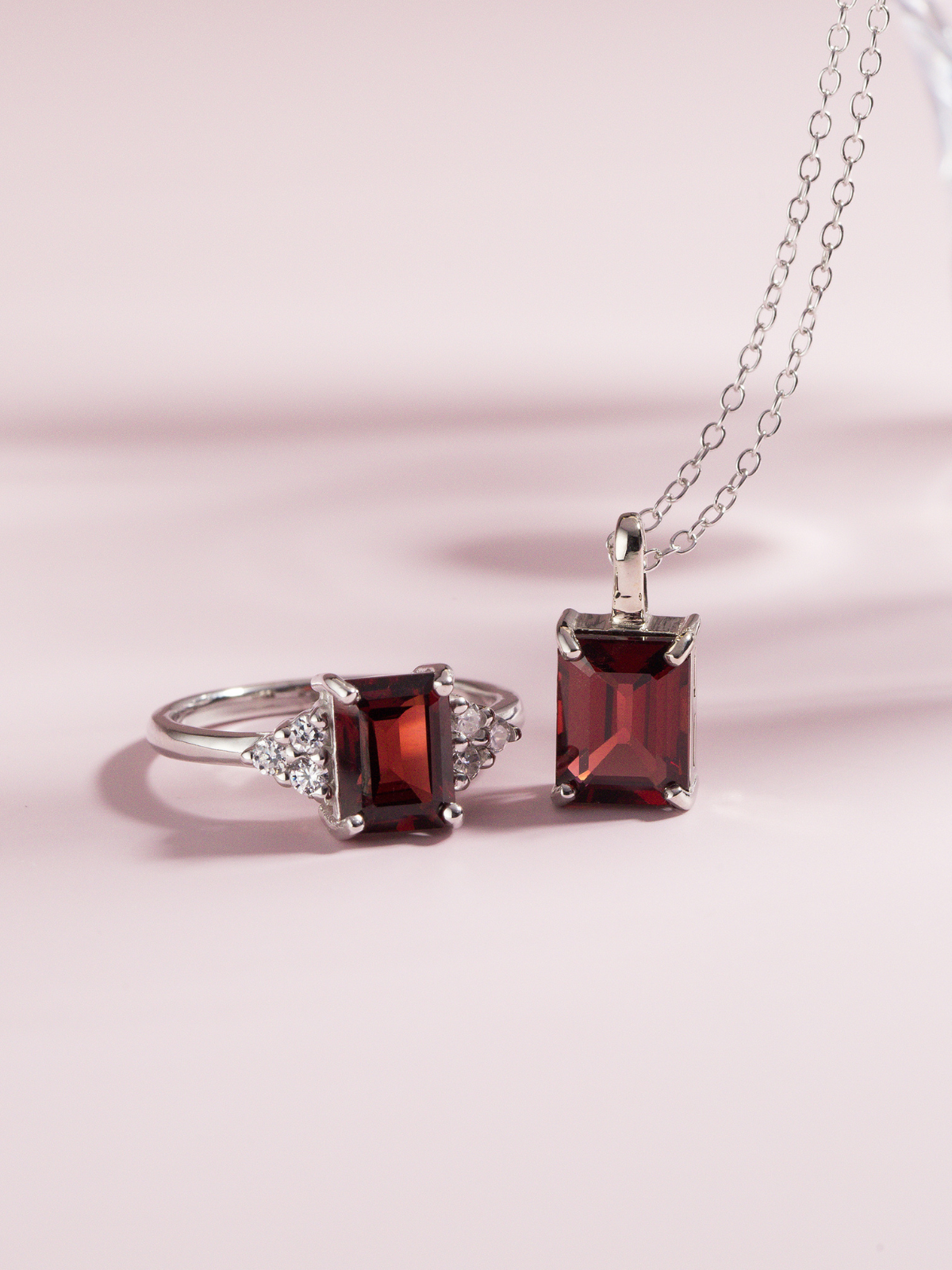 Garnet emerald cut ring and necklace in sterling silver