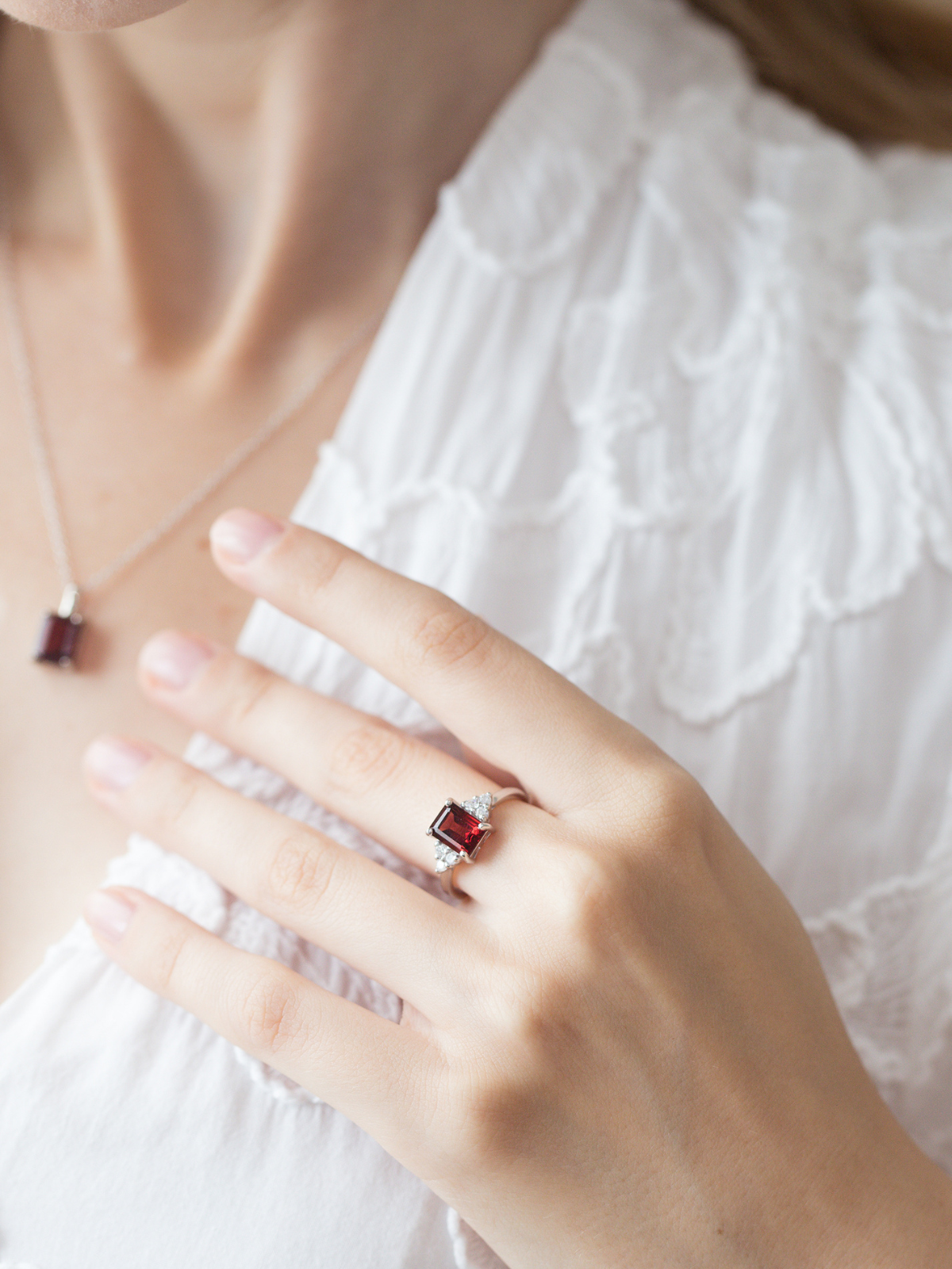 Garnet emerald cut ring and necklace in sterling silver model image