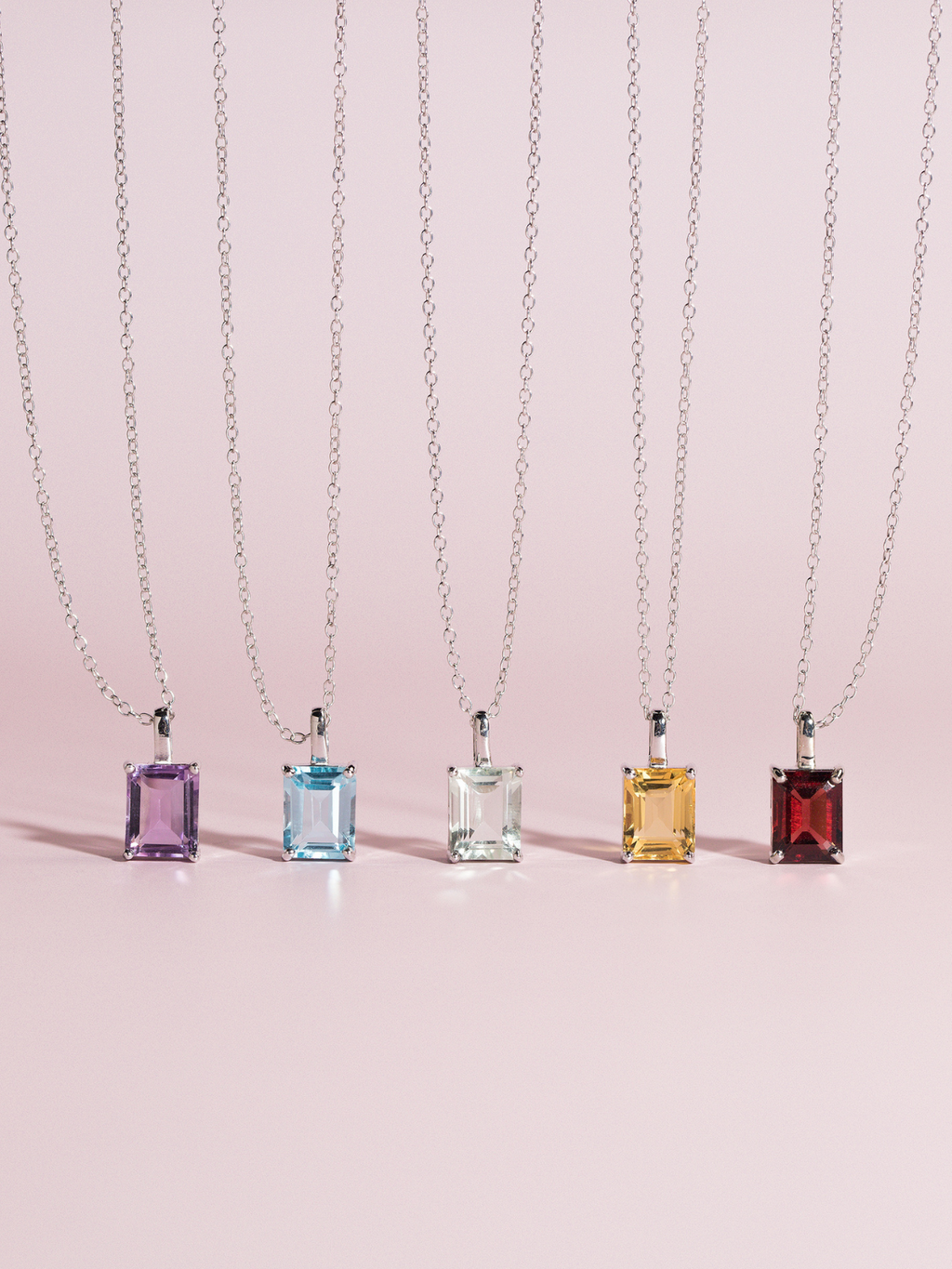 Emerald cut necklaces group image in sterling silver