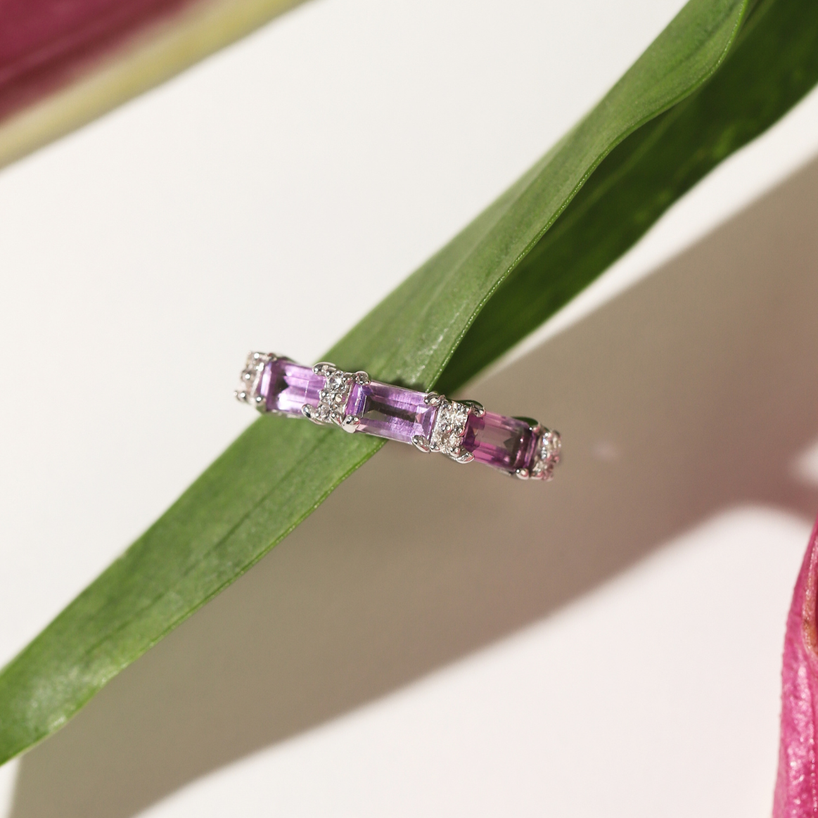 Lavender amethyst emerald cut eternity ring in sterling silver lifestyle image