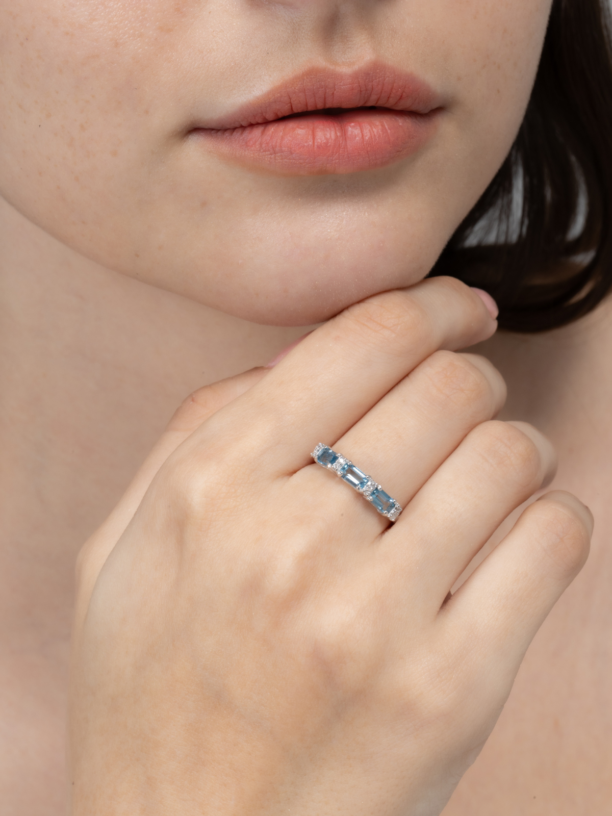 London blue topaz emerald cut eternity band in sterling silver model image