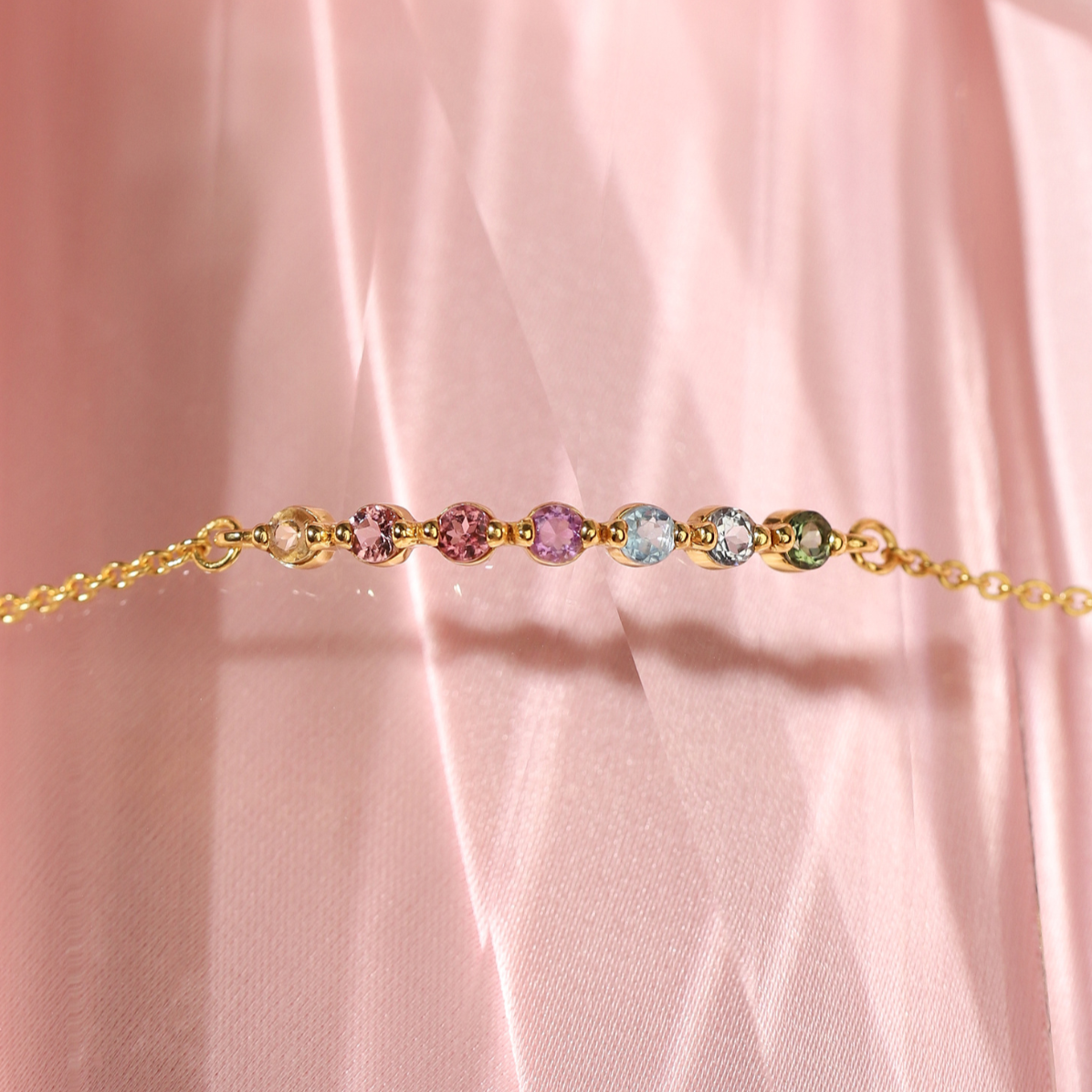 Pastel rainbow gemstone bracelet in 18k gold vermeil lifestyle image