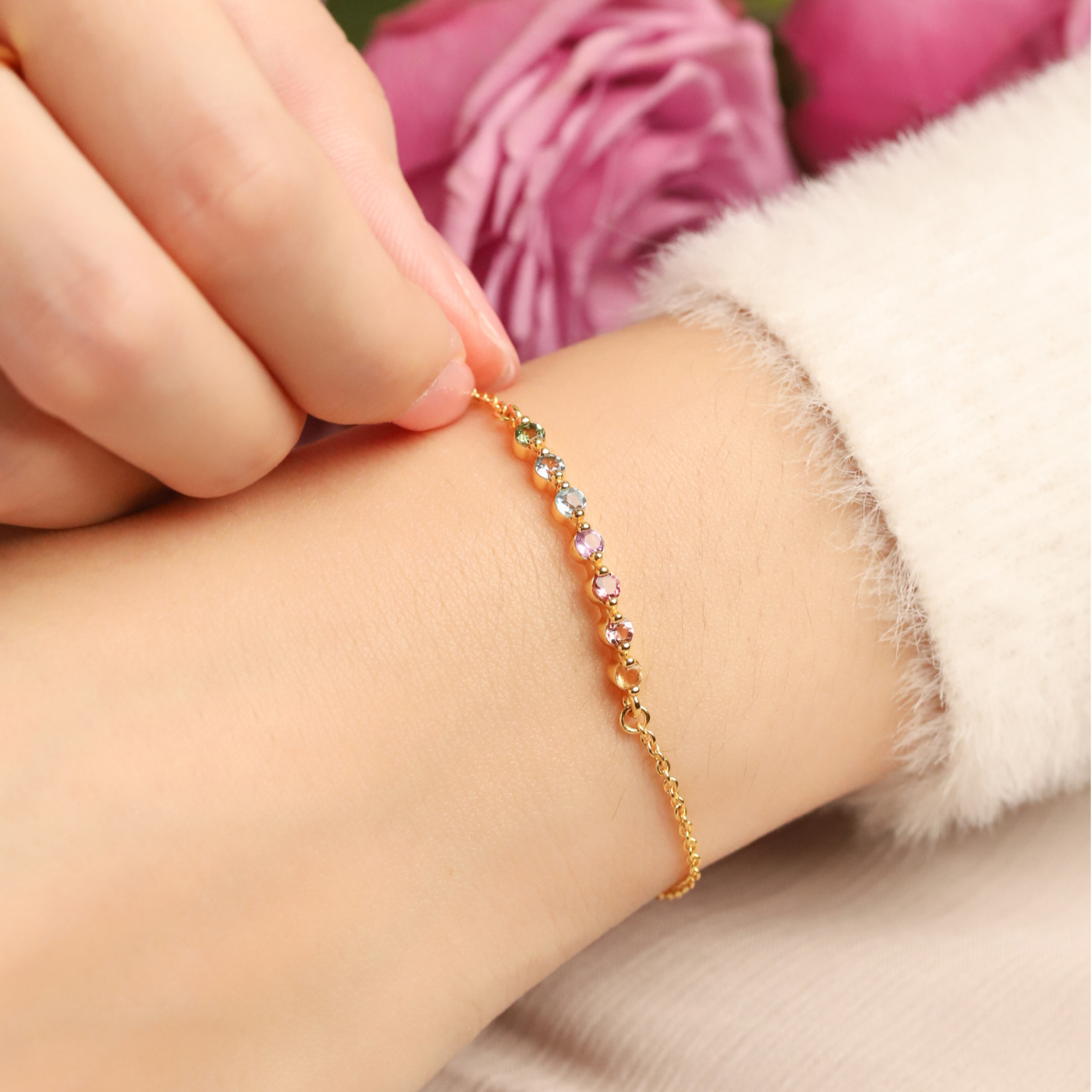 Pastel rainbow gemstone bracelet in 18k gold vermeil on hand