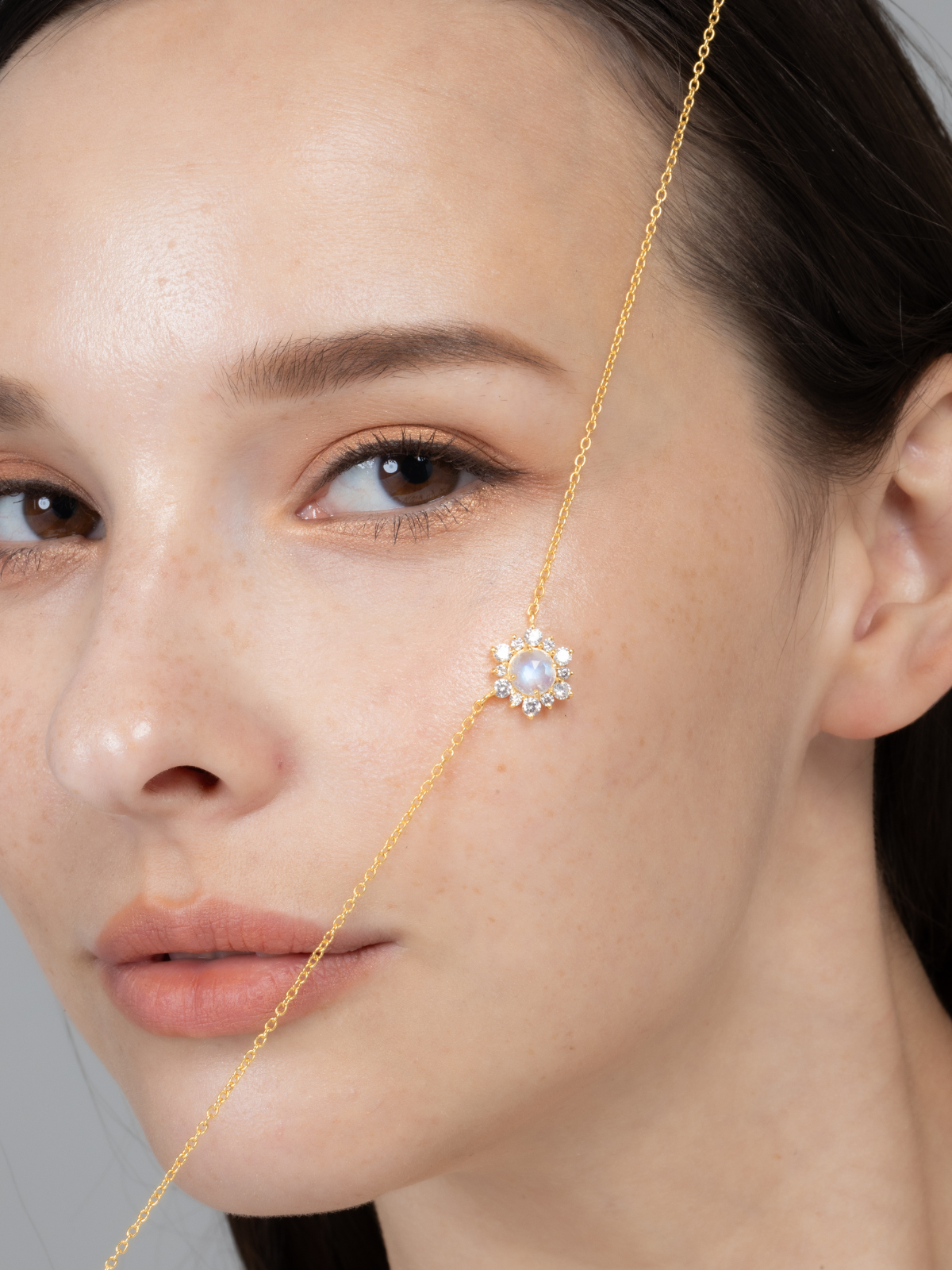 Rainbow moonstone necklace in 18k gold vermeil lifestyle detail image