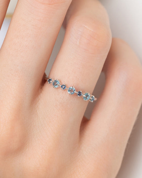 Vianne Jewellery blue sapphire and Swiss blue topaz eternity ring in sterling silver shown on model