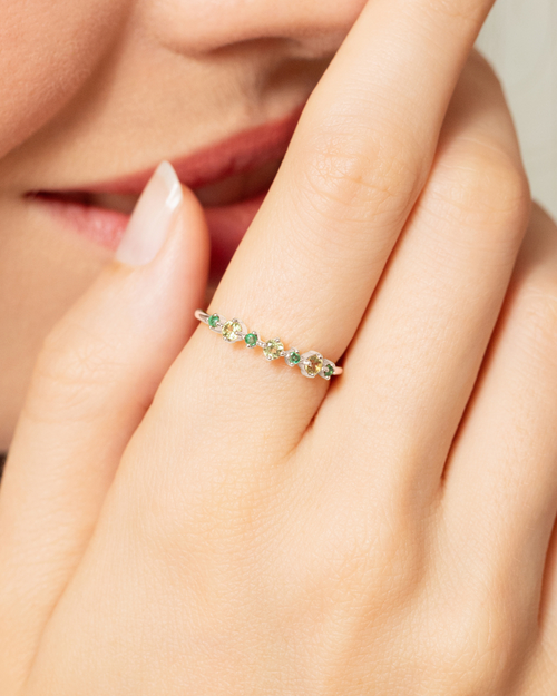 Vianne Jewellery emerald and peridot eternity ring in sterling silver shown on model