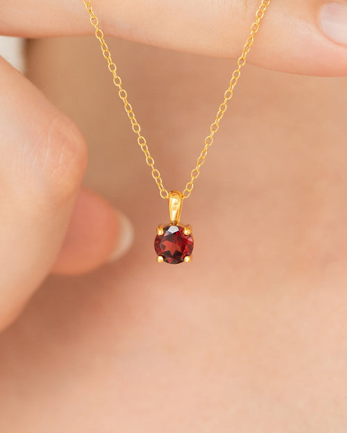 Vianne Jewellery round garnet pendant necklace in 18k gold vermeil shown on model