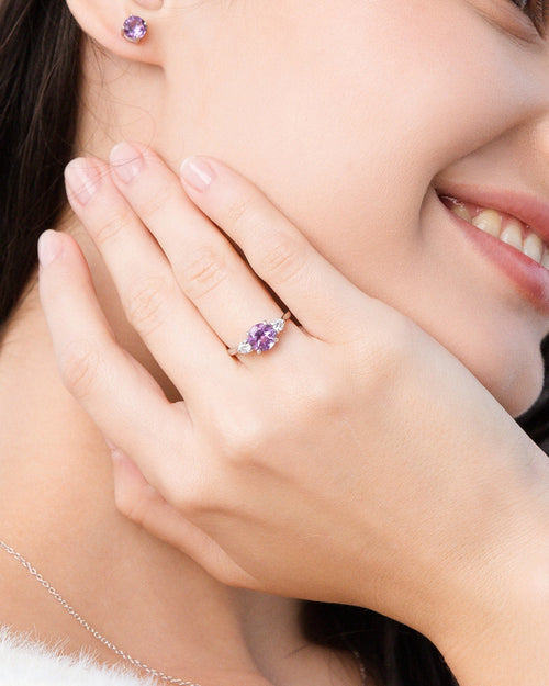 Lavender amethyst three stone ring and round stud earrings in sterling silver on model