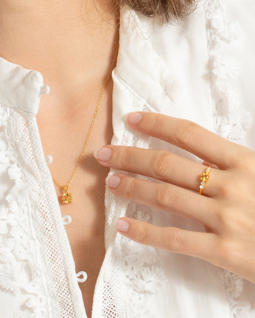 Round cut citrine five-stone ring pendant necklace and bracelet in 18k gold vermeil shown on model