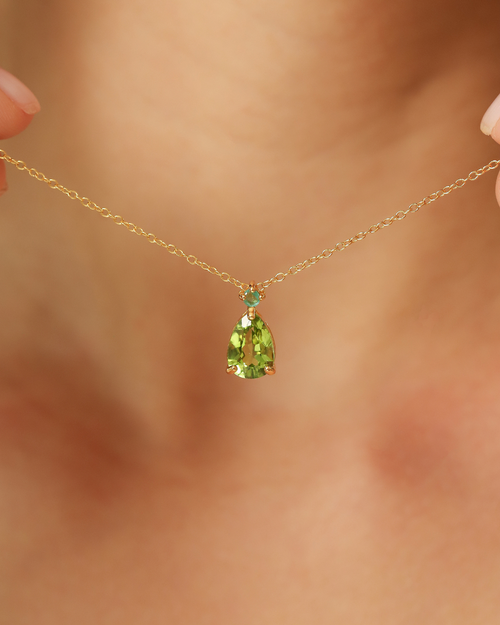 Vianne Jewellery pear cut peridot and emerald pendant necklace in 18k gold vermeil shown on model
