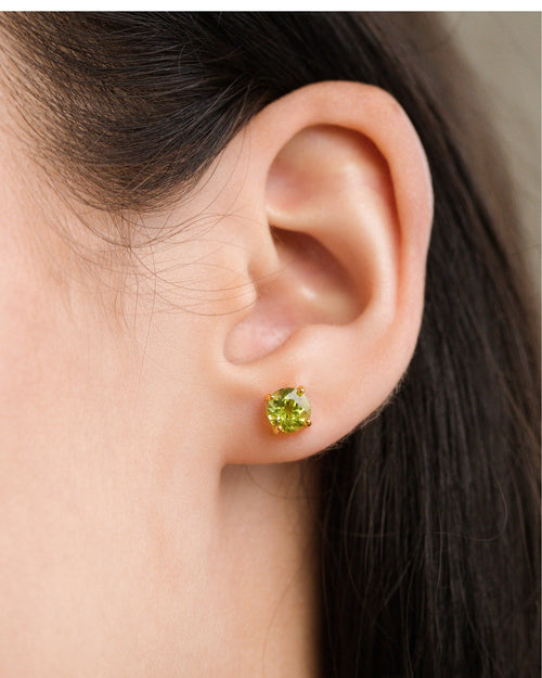 Peridot round stud earrings in 18k gold vermeil model image