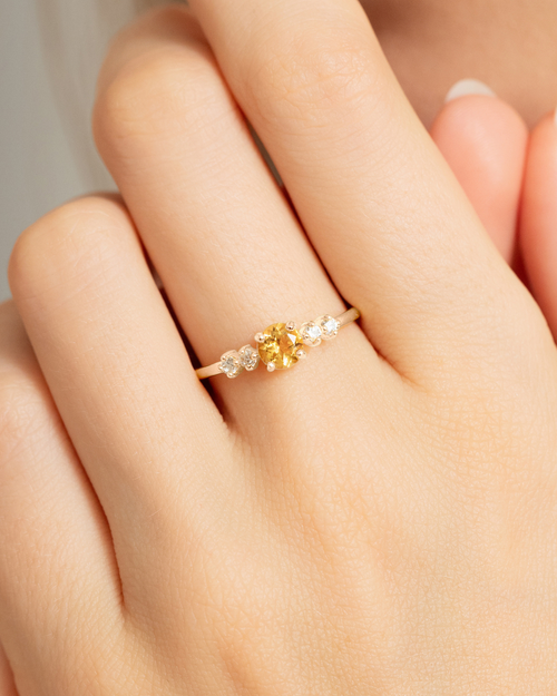 Vianne Jewellery round cut citrine five-stone ring in sterling silver shown on model