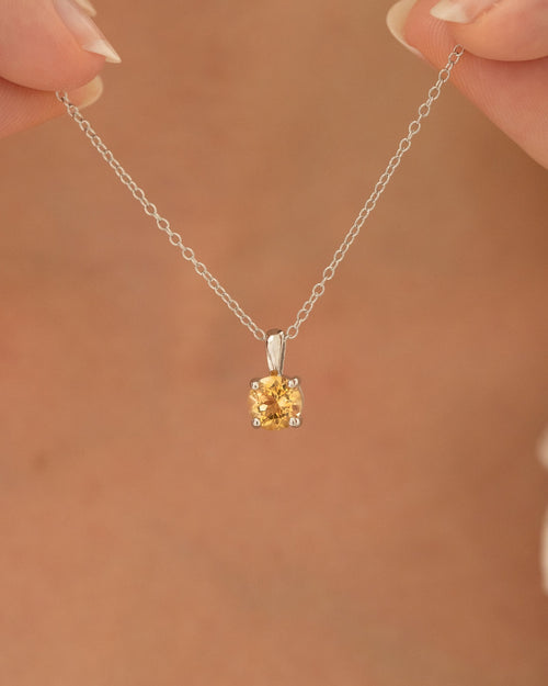 Vianne Jewellery round citrine pendant necklace 6mm in sterling silver shown on model