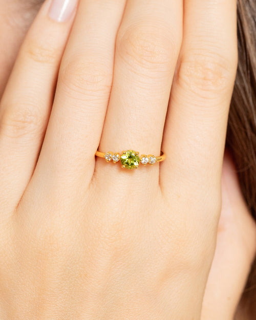 Vianne Jewellery round cut peridot five-stone ring in 18k gold vermeil shown on model
