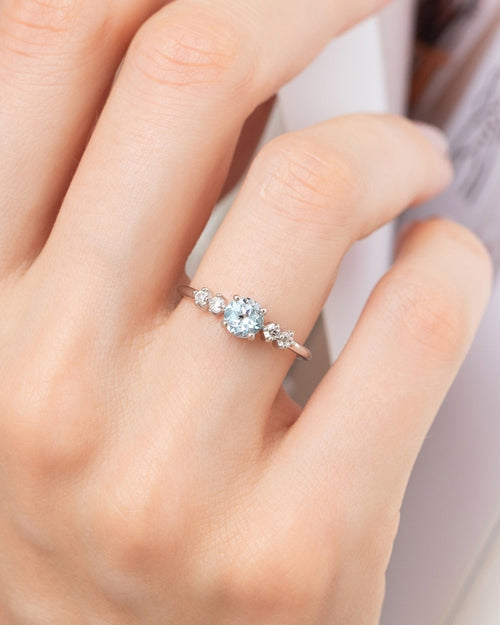 Vianne Jewellery round cut sky blue topaz five-stone ring in sterling silver shown on model