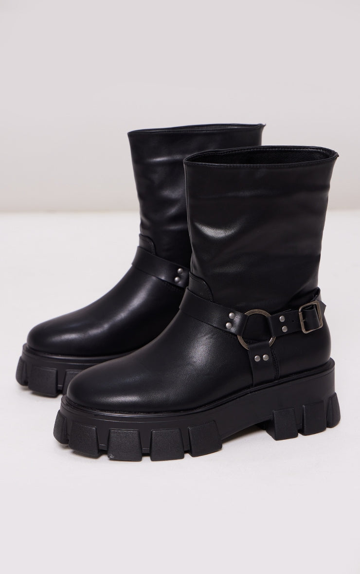 Kenike black ankle boots buckle strap side profile