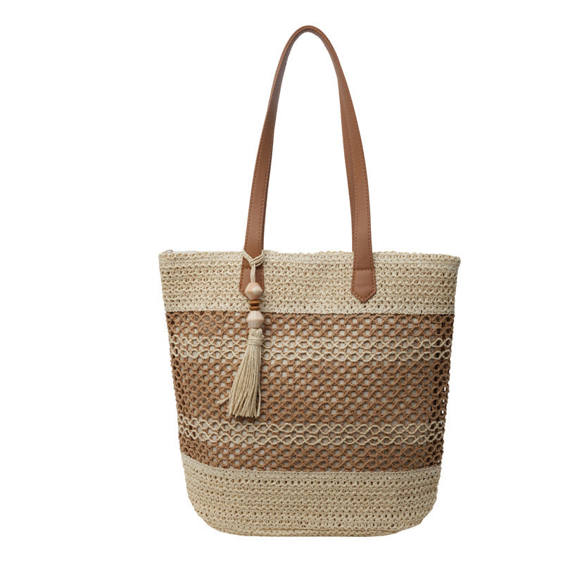 Kenike stripe straw beach bag with tassel pendant front view
