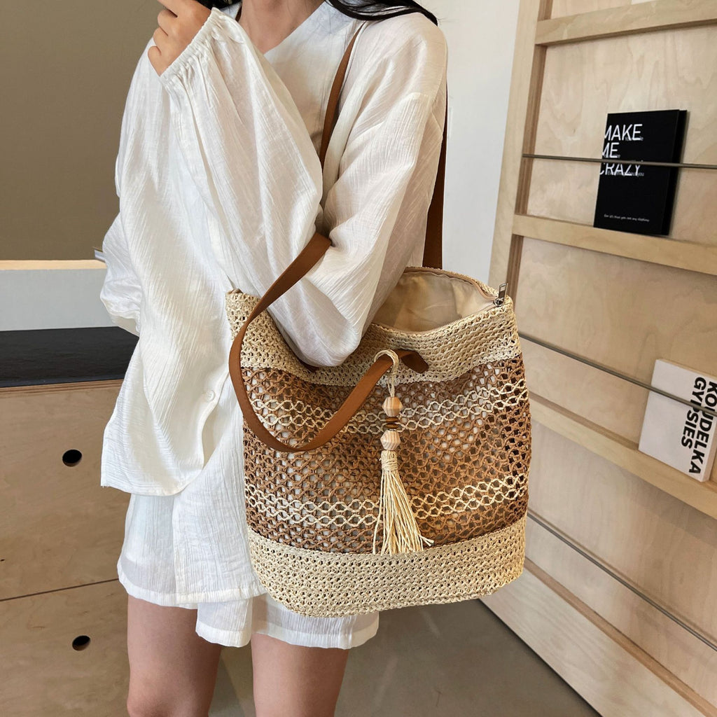 Kenike stripe straw beach bag handle and weave detail
