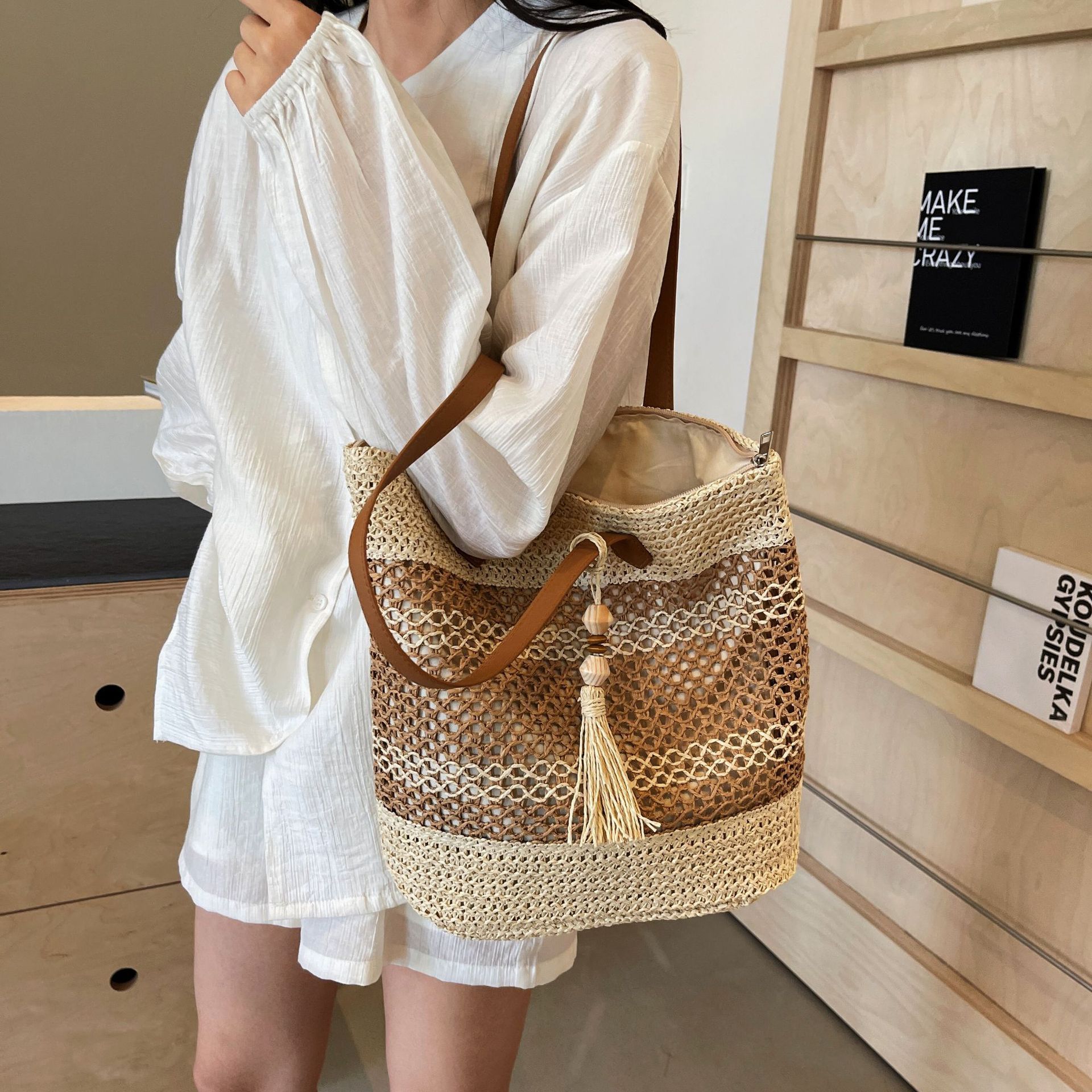 Kenike stripe straw beach bag handle and weave detail