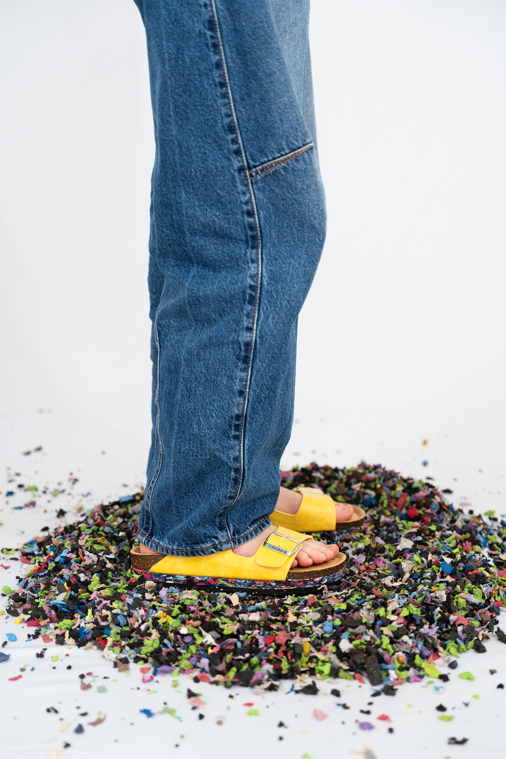 Nuoceans YUZU yellow recycled vegan leather sandal worn lifestyle image