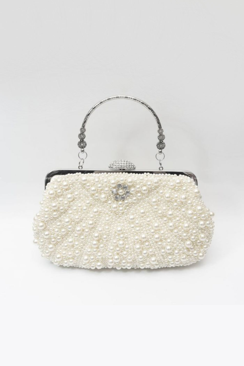 Aftershock London ivory pearl and crystal clutch bag studio view