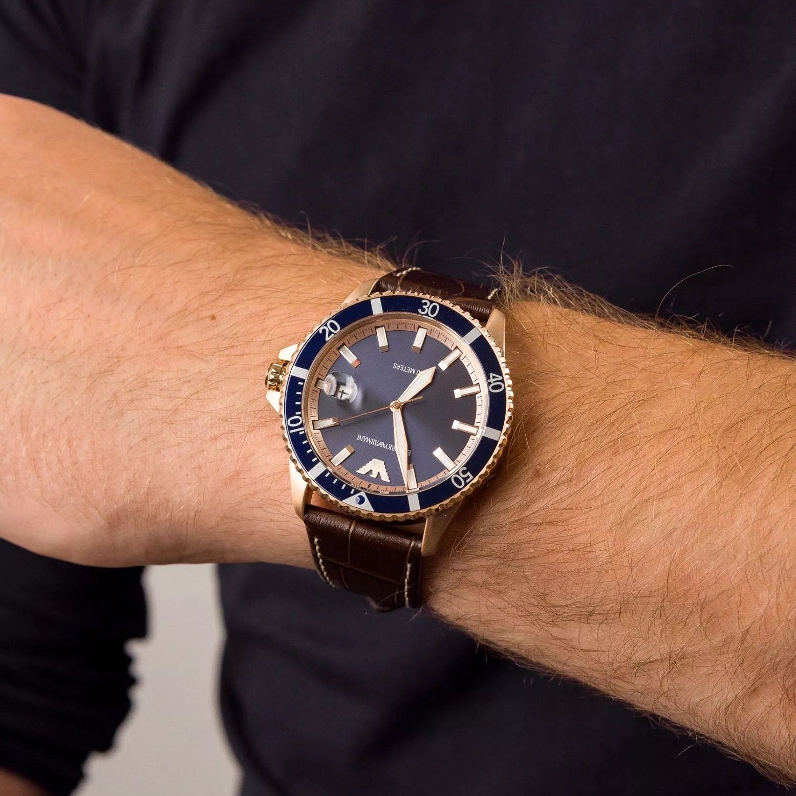 Emporio Armani AR11556 watch on wrist with brown leather strap