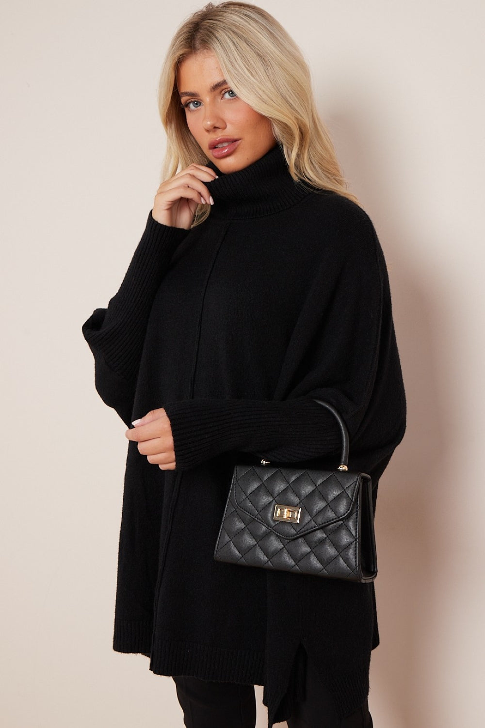 Aftershock London black quilted handbag side detail image