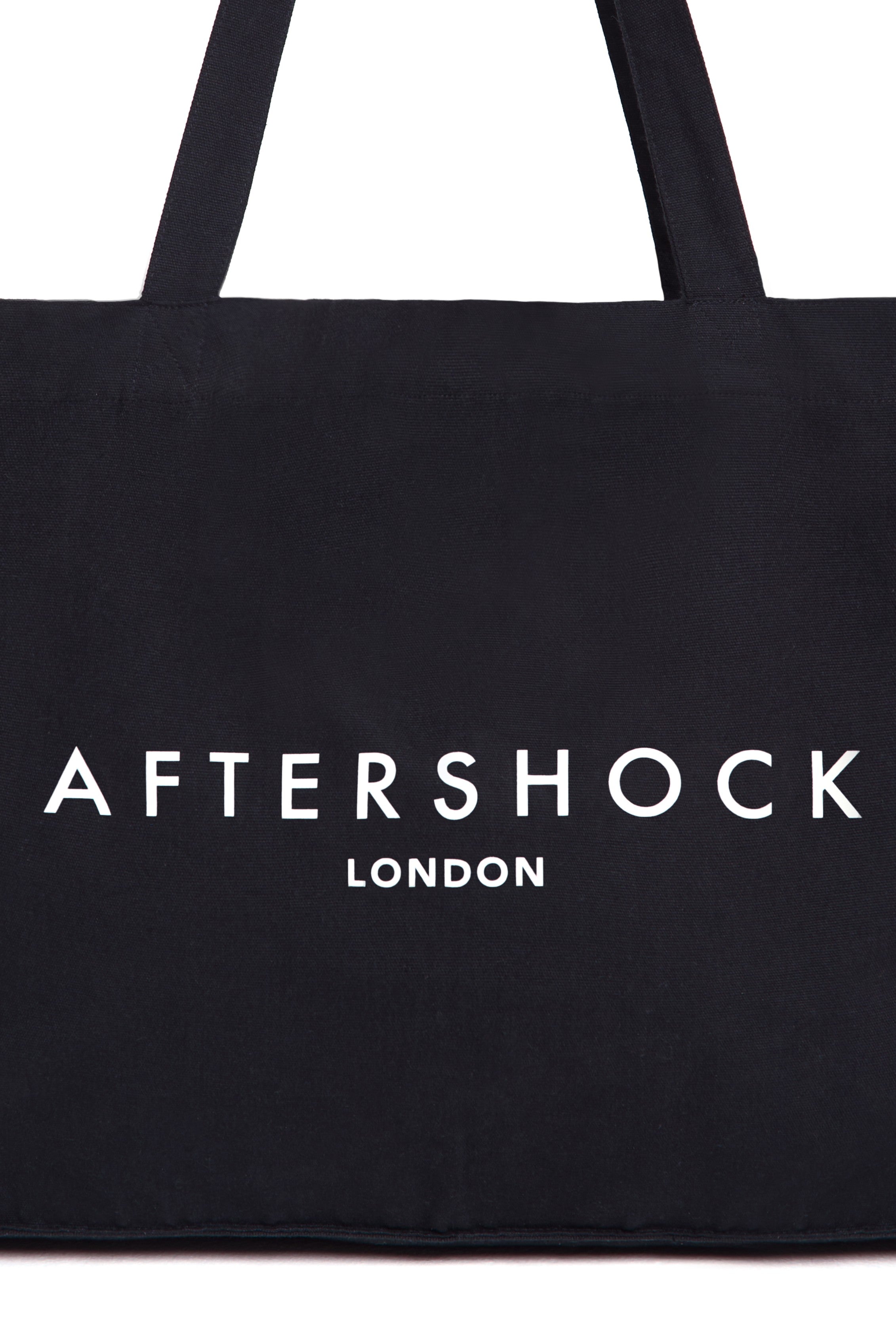 Aftershock London black logo canvas tote bag back view