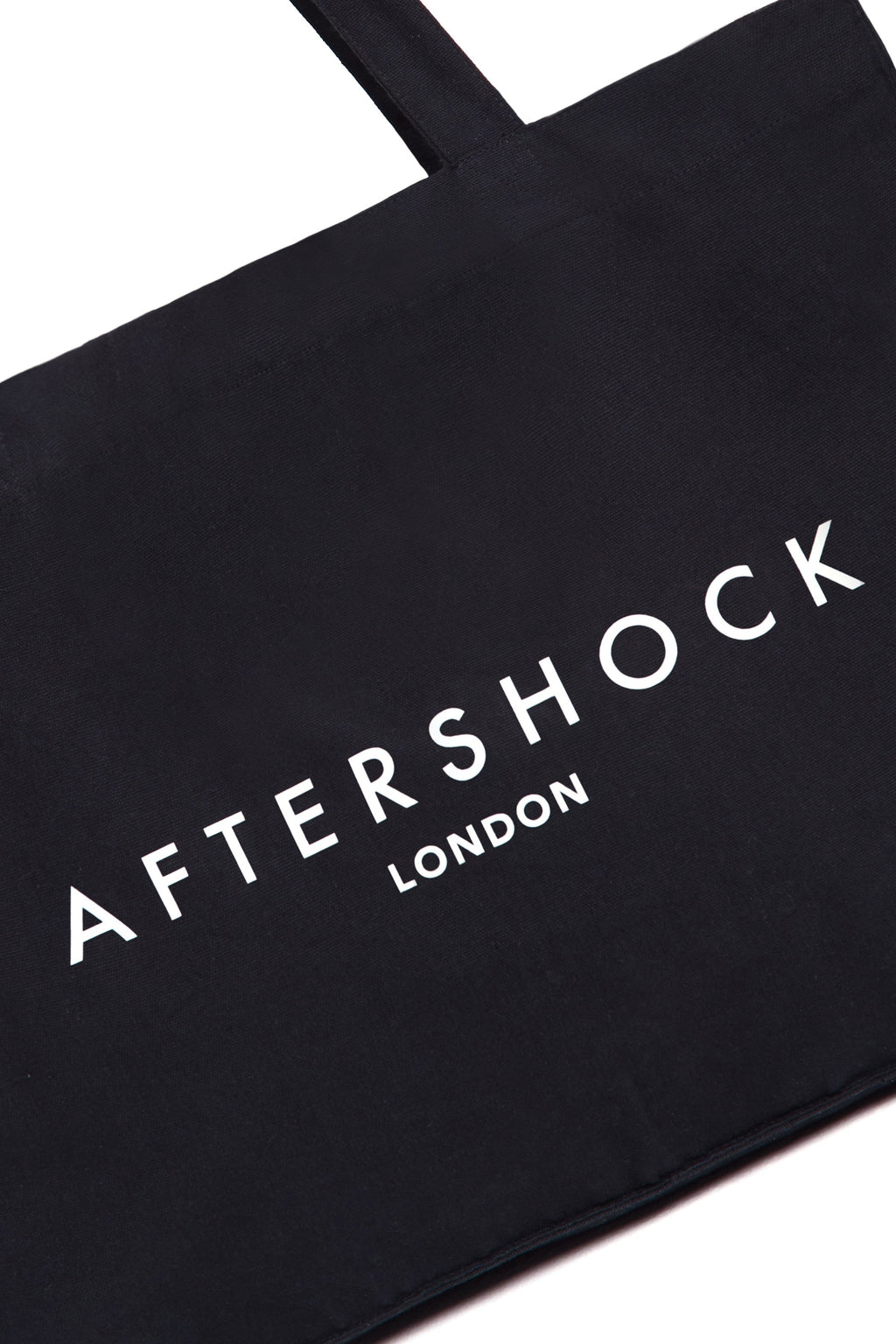 Aftershock London black logo canvas tote bag side detail