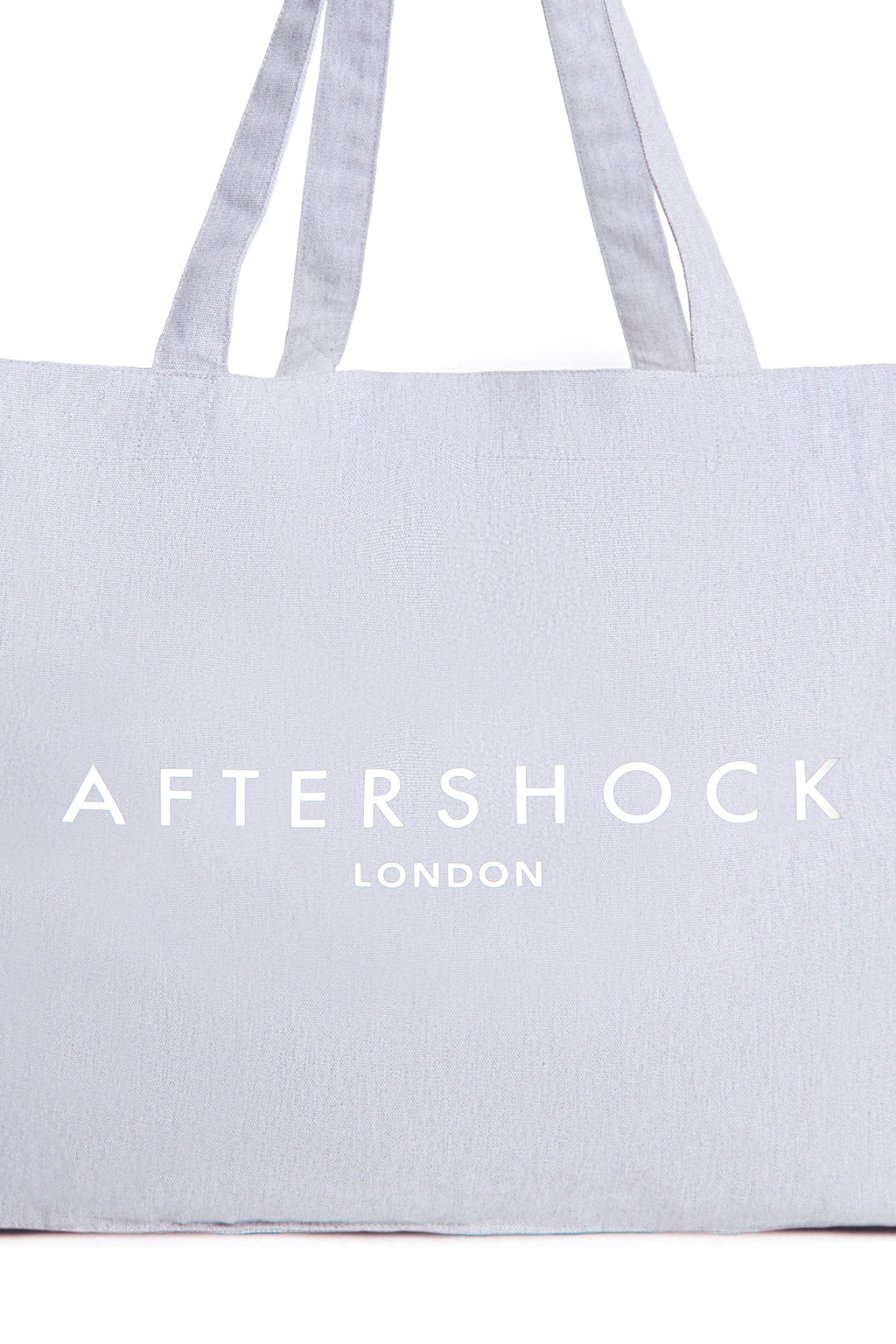 Aftershock London silver grey logo canvas tote bag back detail
