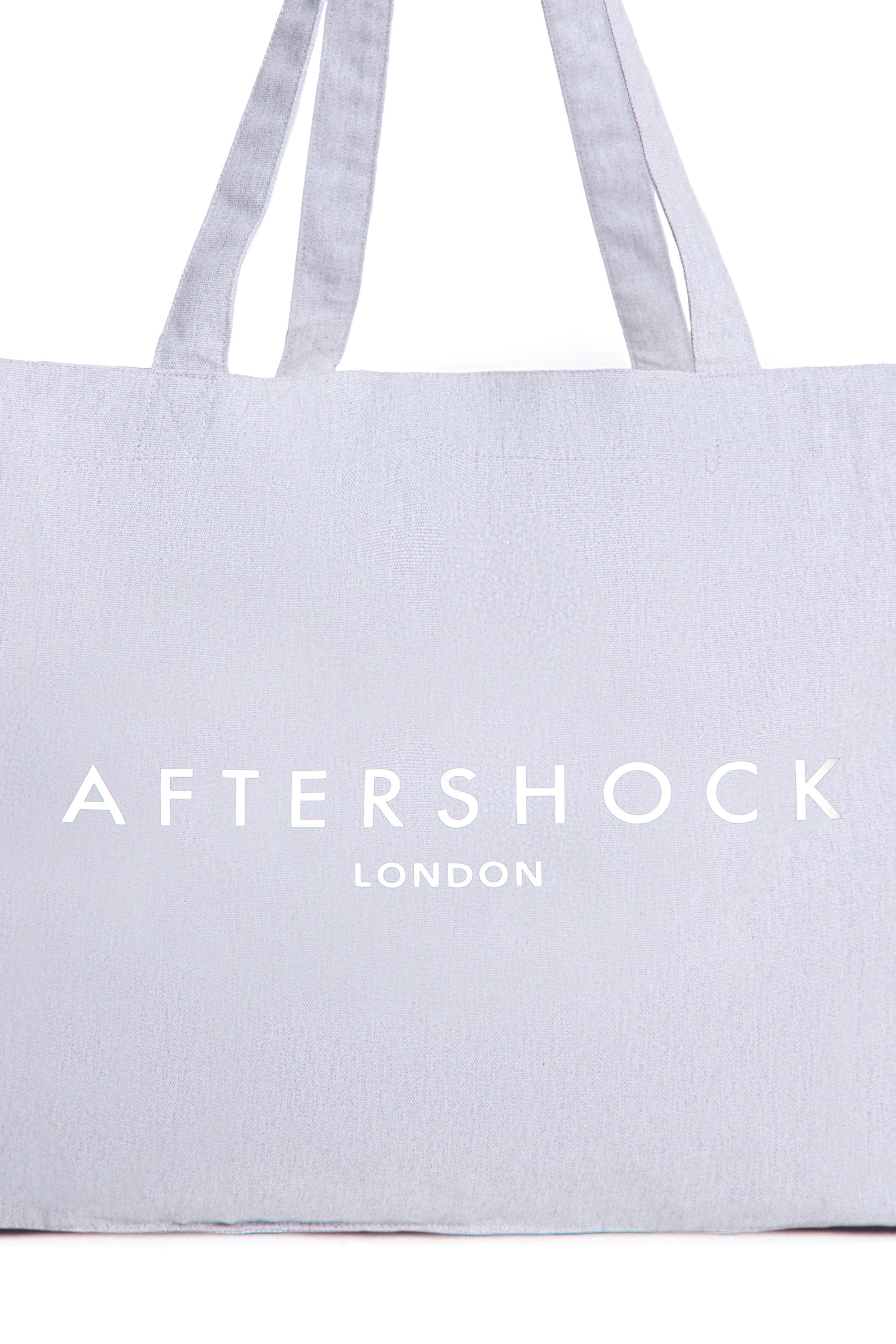 Aftershock London silver grey logo canvas tote bag back detail