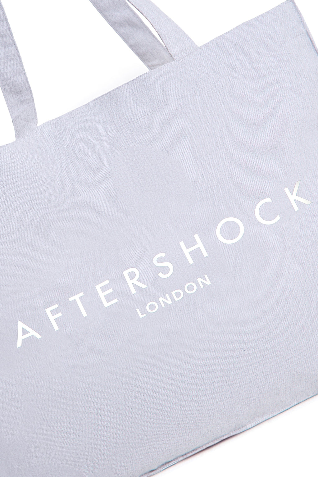 Aftershock London silver grey logo canvas tote bag side view