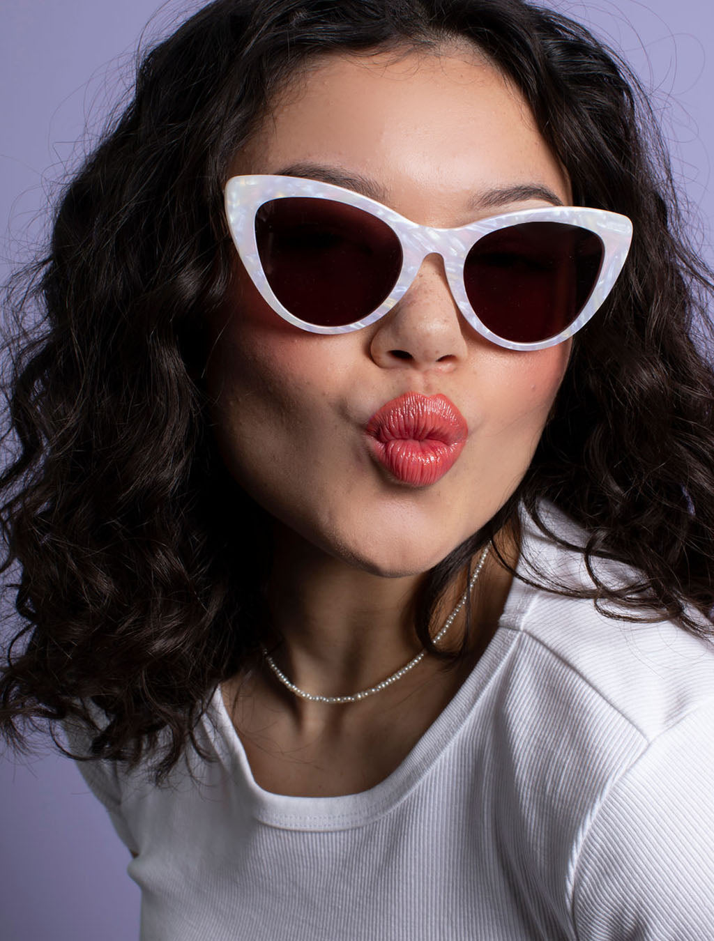 zoedepass Amy Opal cat-eye sunglasses close-up on model