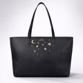 Luna Charles Anya star studded tote bag in black and gold main product image