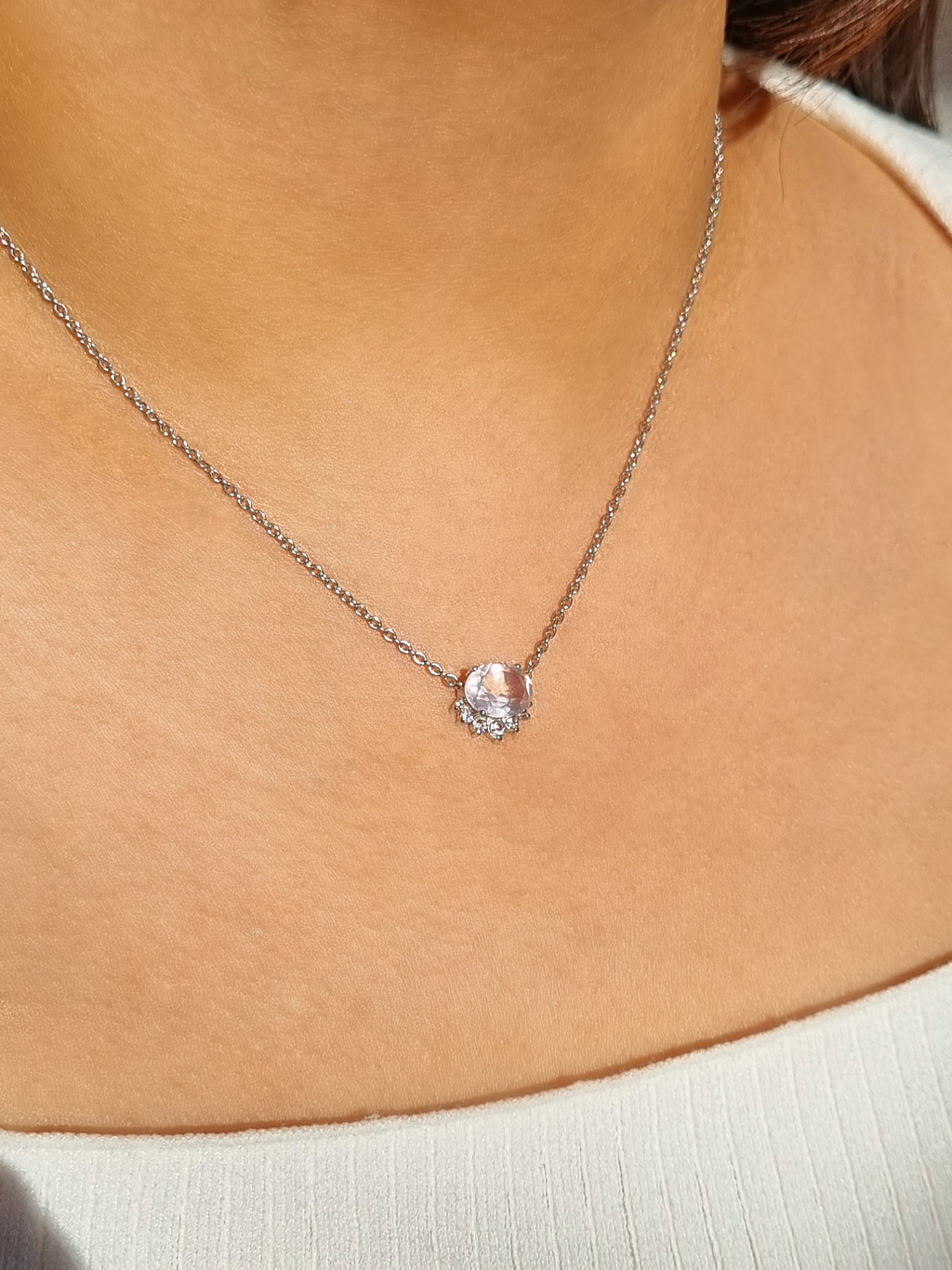Aria rose quartz necklace in sterling silver on neck