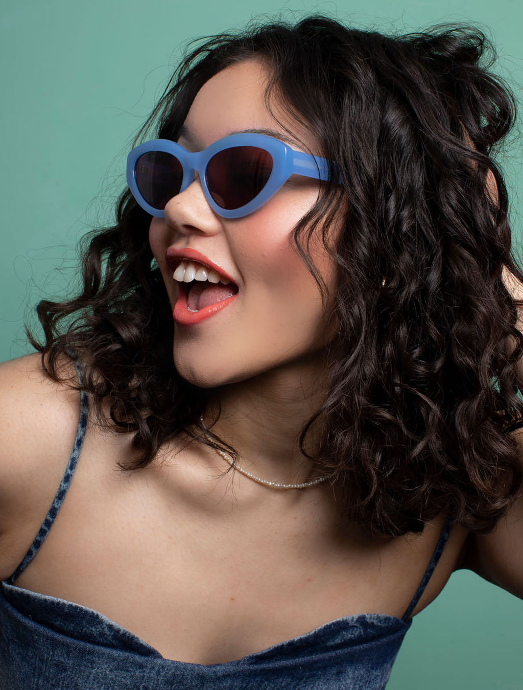 zoedepass Billie Sky Blue oval cat-eye sunglasses close-up on model