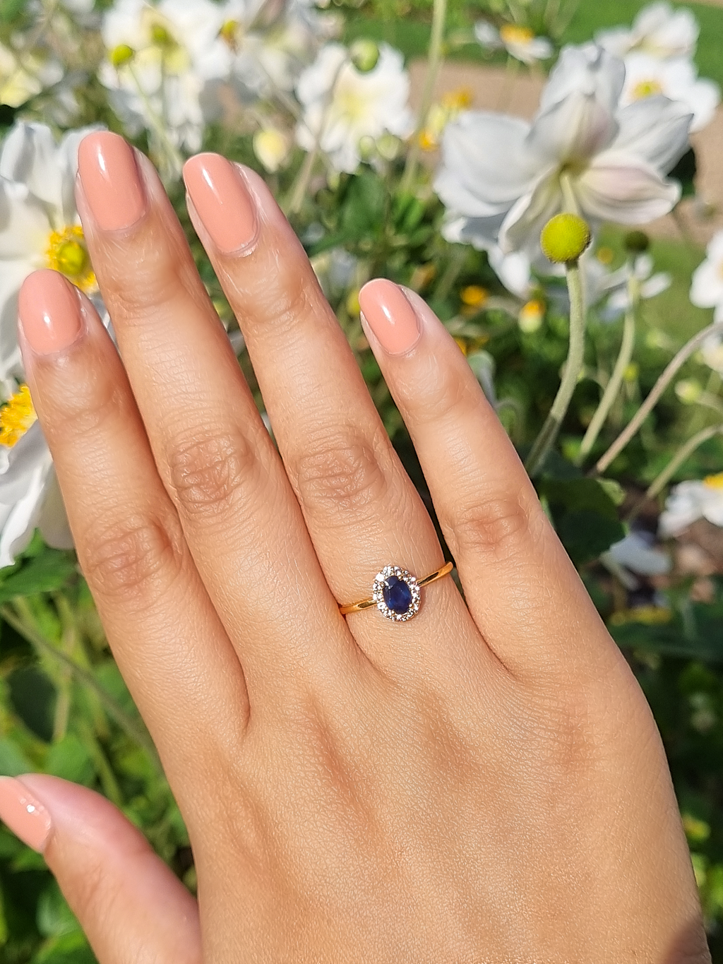Blue sapphire ring in 18k gold vermeil on hand